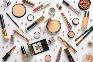 Photo of Different luxury makeup products on white background, top view