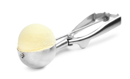 Photo of Delicious vanilla ice cream in scoop on white background