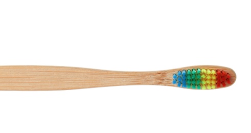 Photo of Bamboo toothbrush on white background. Dental care