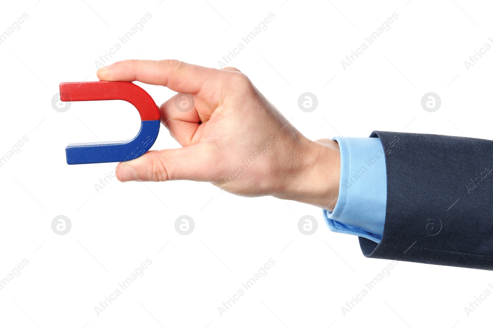 Photo of Man holding magnet on white background, closeup