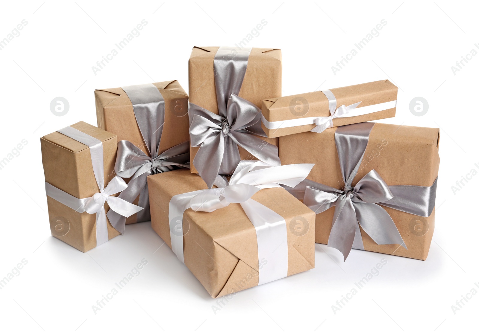 Photo of Beautifully wrapped gift boxes on white background