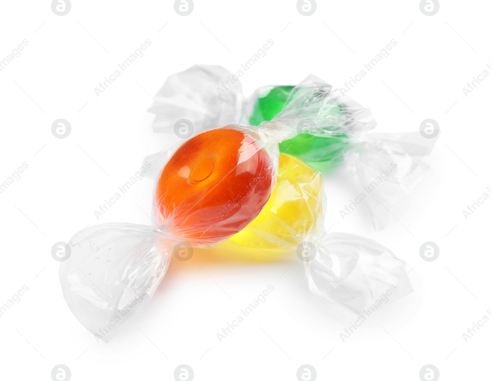 Photo of Different delicious colorful candies on white background