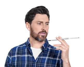 Man using long cigarette holder for smoking isolated on white