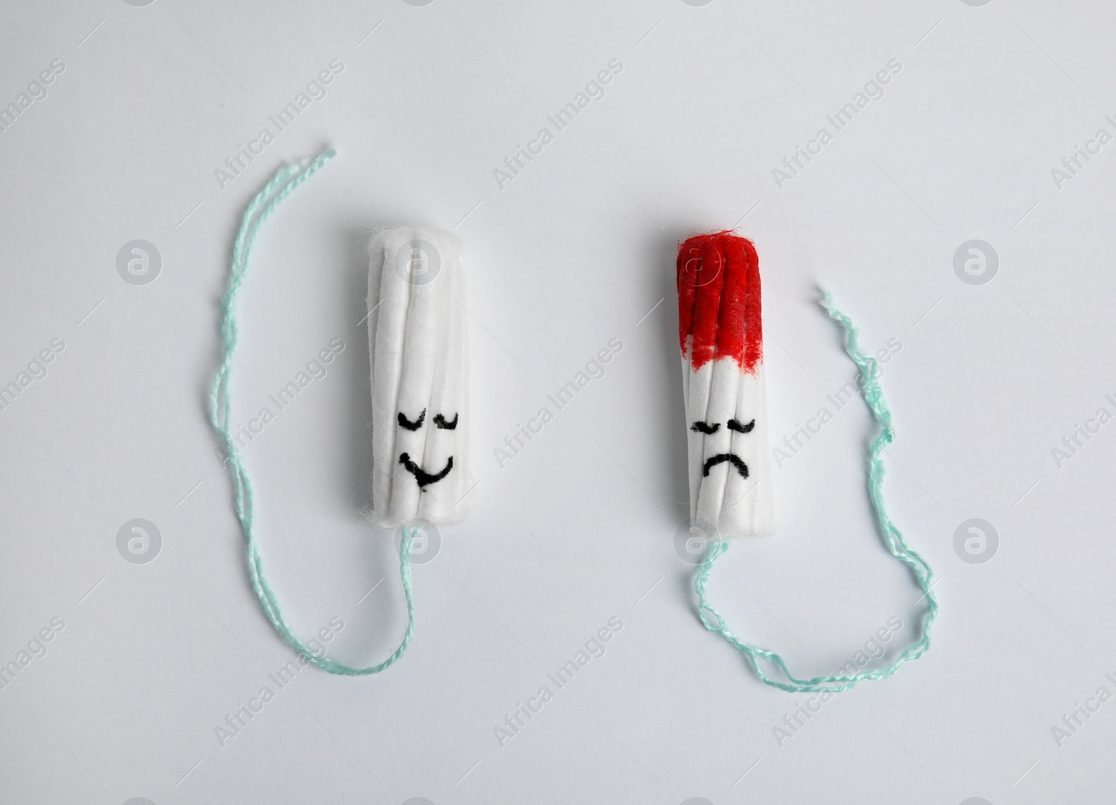 Photo of Clean and used tampons on light background, flat lay