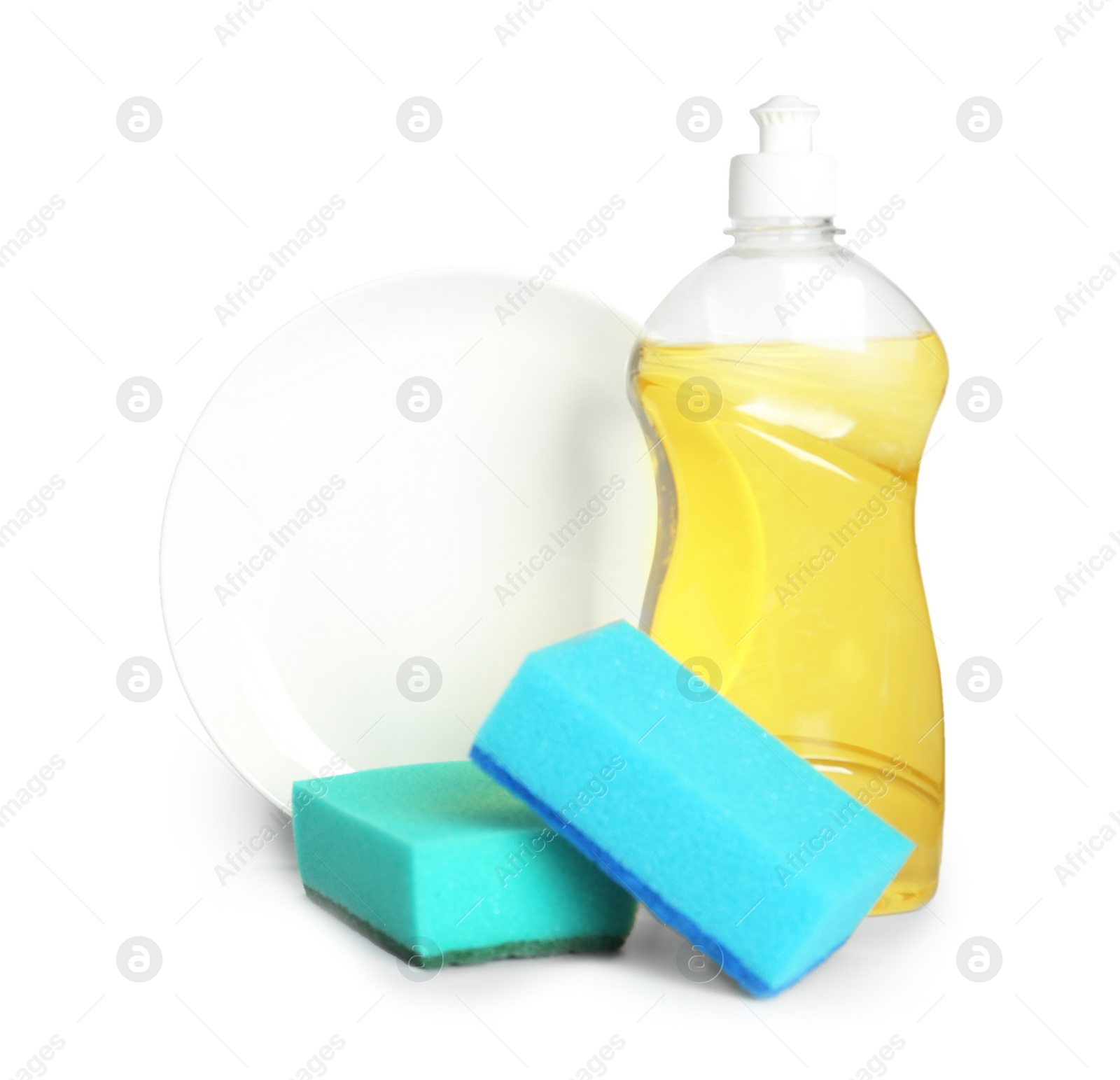 Photo of Detergent, plate and sponges on light background, space for text. Clean dishes