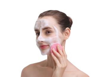 Photo of Happy young woman washing her face with sponge on white background