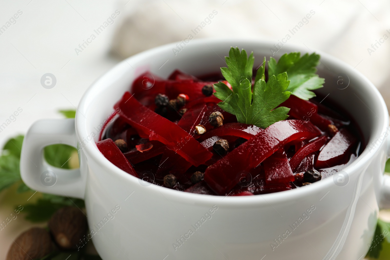 Photo of Delicious pickled beets in bowl, closeup view