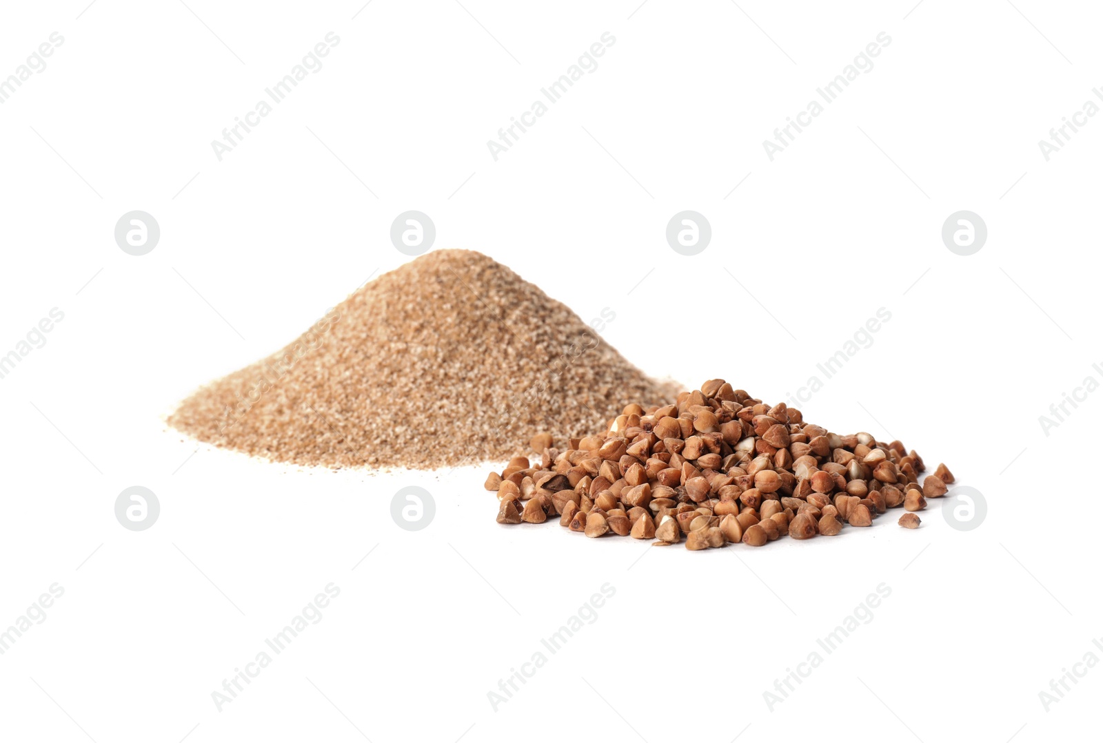 Photo of Pile of fresh flour and buckwheat isolated on white