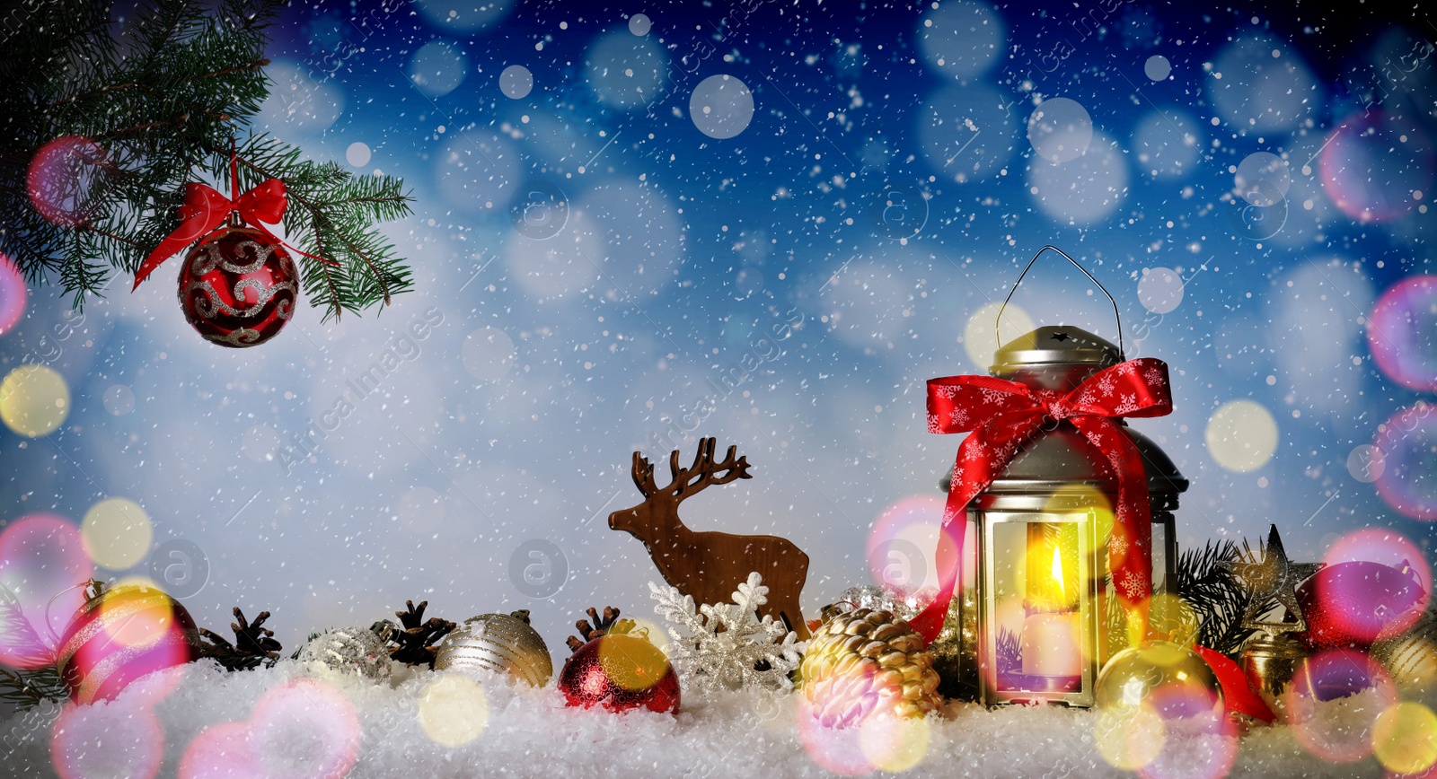 Image of Beautiful composition with vintage Christmas lantern and festive decorations on snow against color background, banner design. Bokeh effect