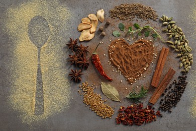 Flat lay composition with different spices and silhouette of spoon on grey textured table