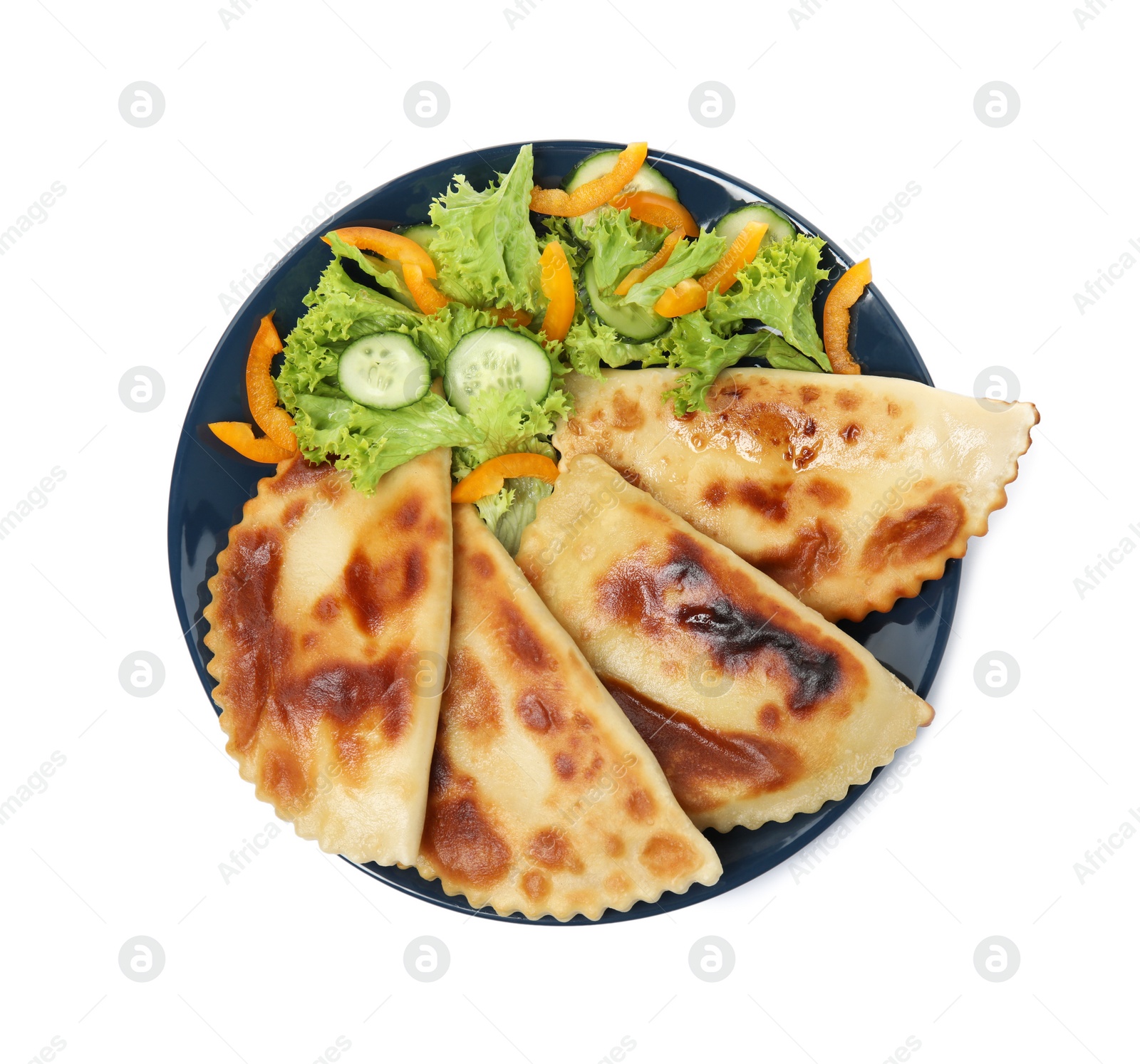 Photo of Delicious fried chebureki with vegetables isolated on white, top view