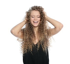 Portrait of beautiful young woman with shiny wavy hair on white background