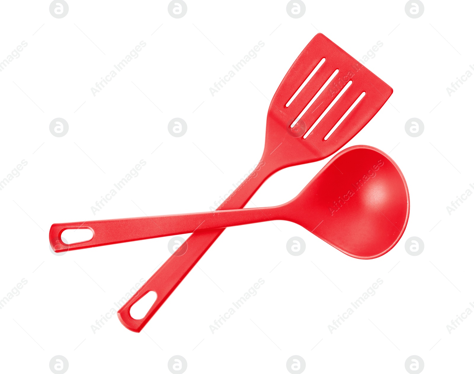 Photo of Slotted spatula and soup ladle on white background
