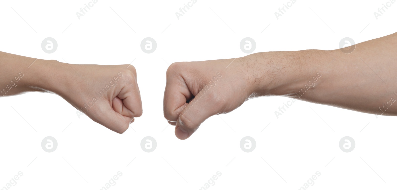 Photo of People making fist bump on white background, closeup