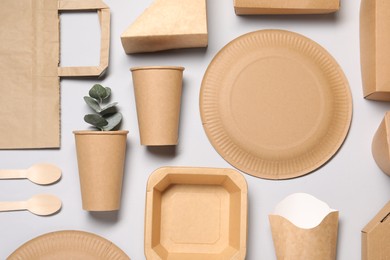 Flat lay composition with eco friendly food packagings on light grey background