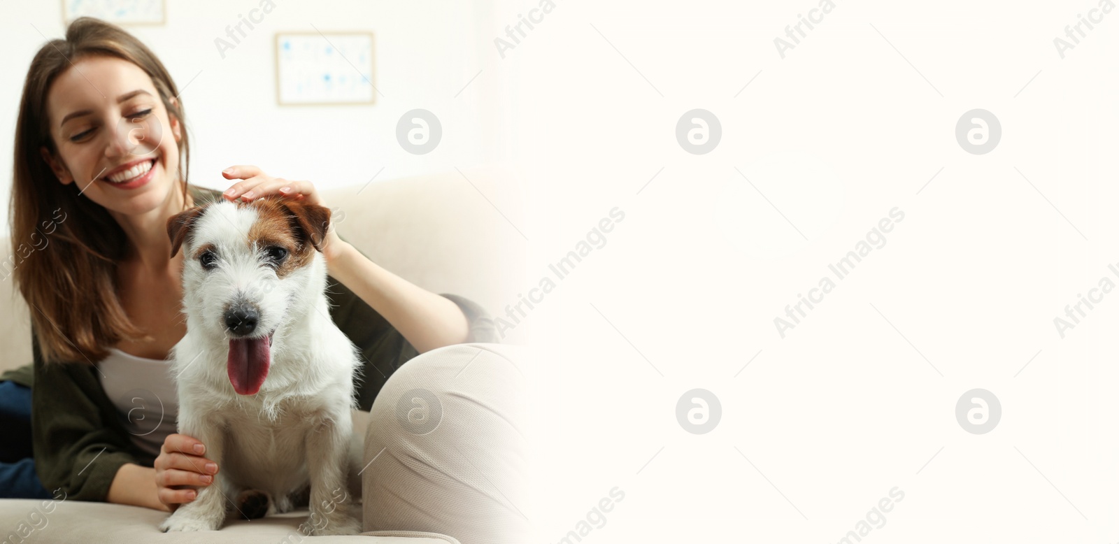 Image of Young woman with her cute pet at home, space for text. Banner design