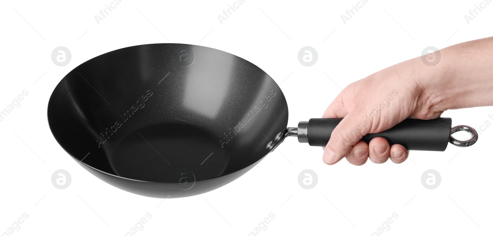 Photo of Man holding empty metal wok on white background, closeup