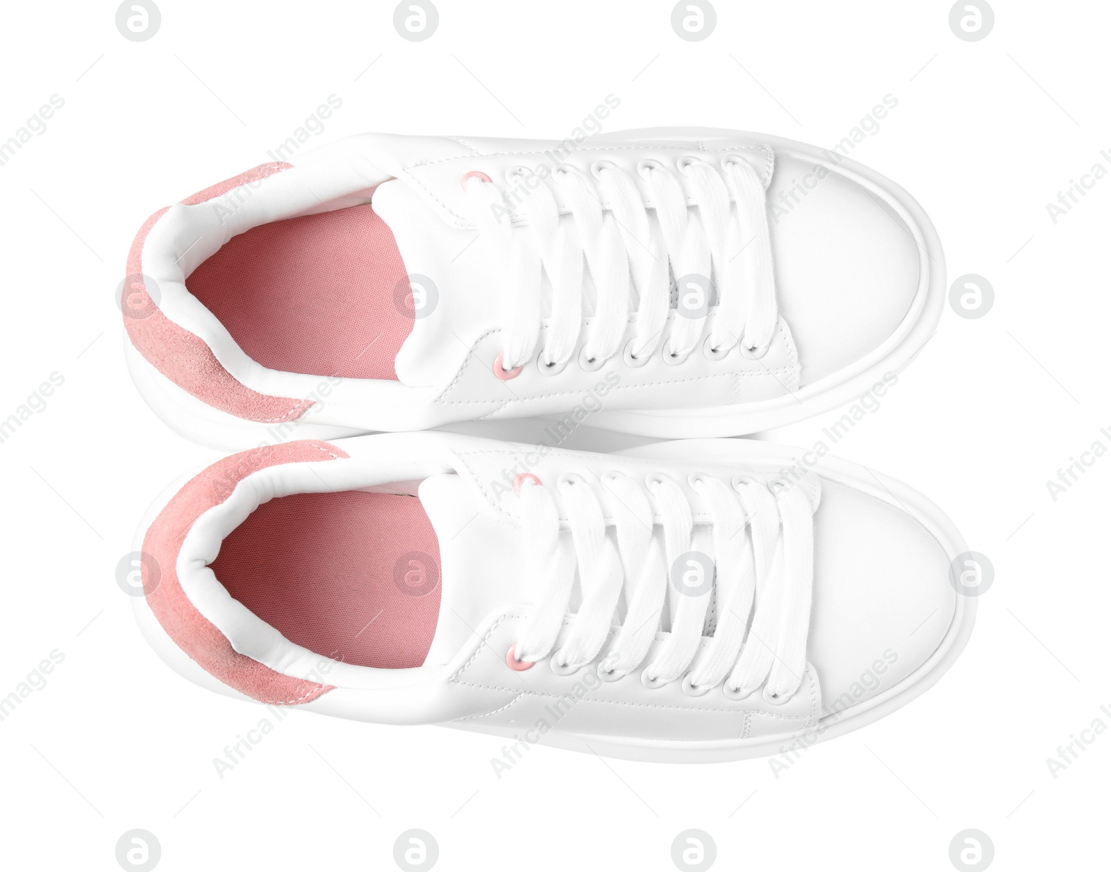 Photo of Pair of stylish sneakers on white background, top view