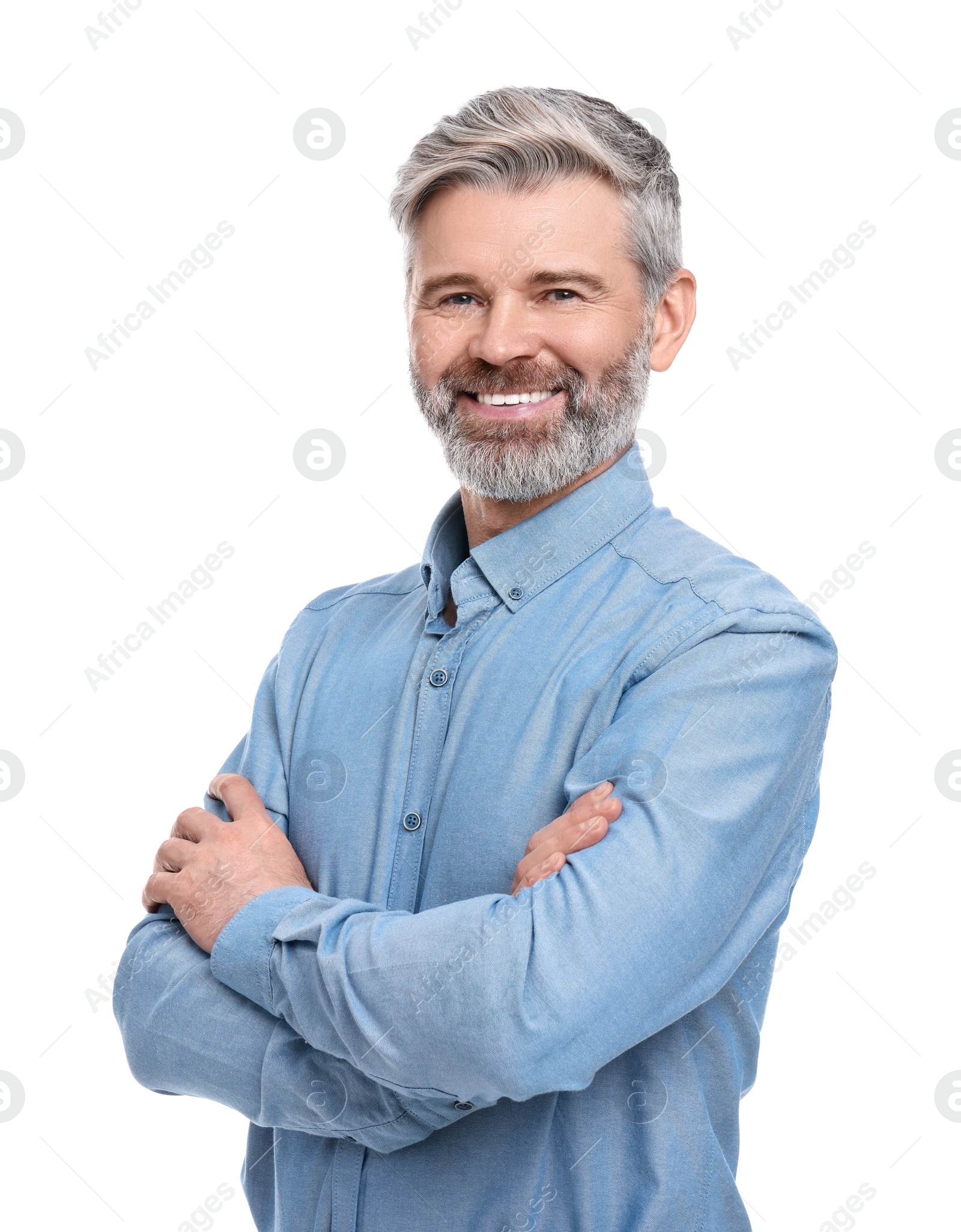 Photo of Mature businessman in stylish clothes posing on white background