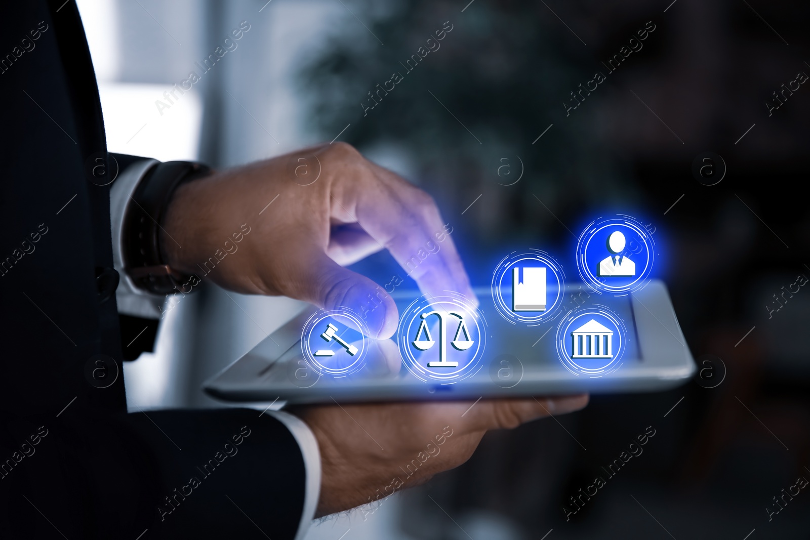 Image of Laws, legal information and online consultation. Man using tablet, closeup. Icons over device
