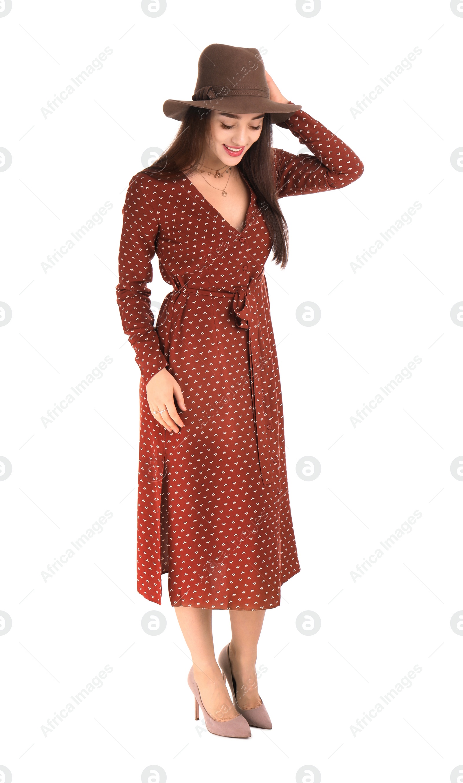 Photo of Portrait of beautiful young woman in stylish dress on white background