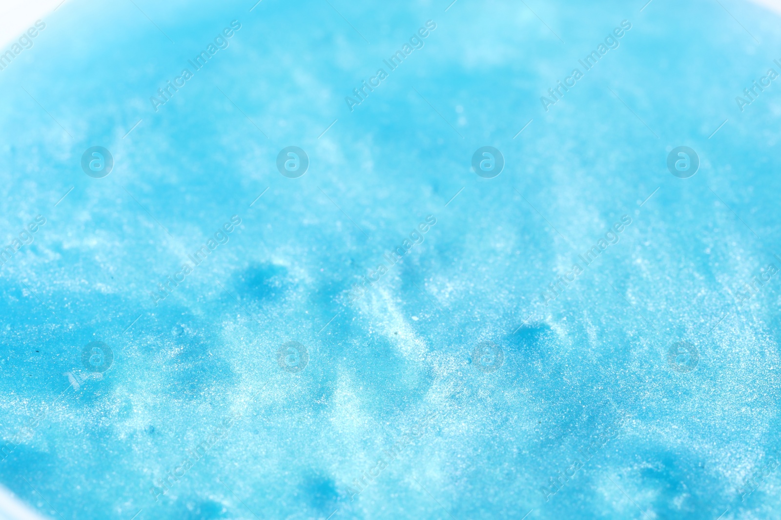 Photo of Closeup view of blue slime. Antistress toy