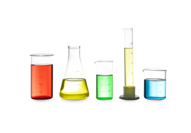 Photo of Different laboratory glassware with colorful liquids isolated on white