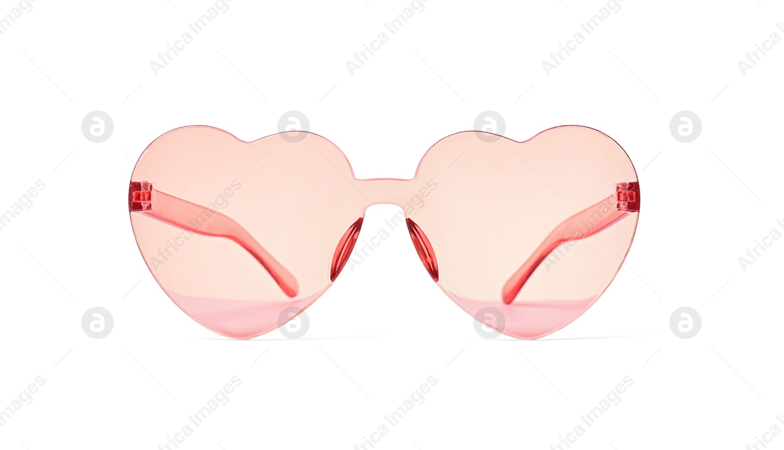 Photo of Stylish heart shaped glasses on white background