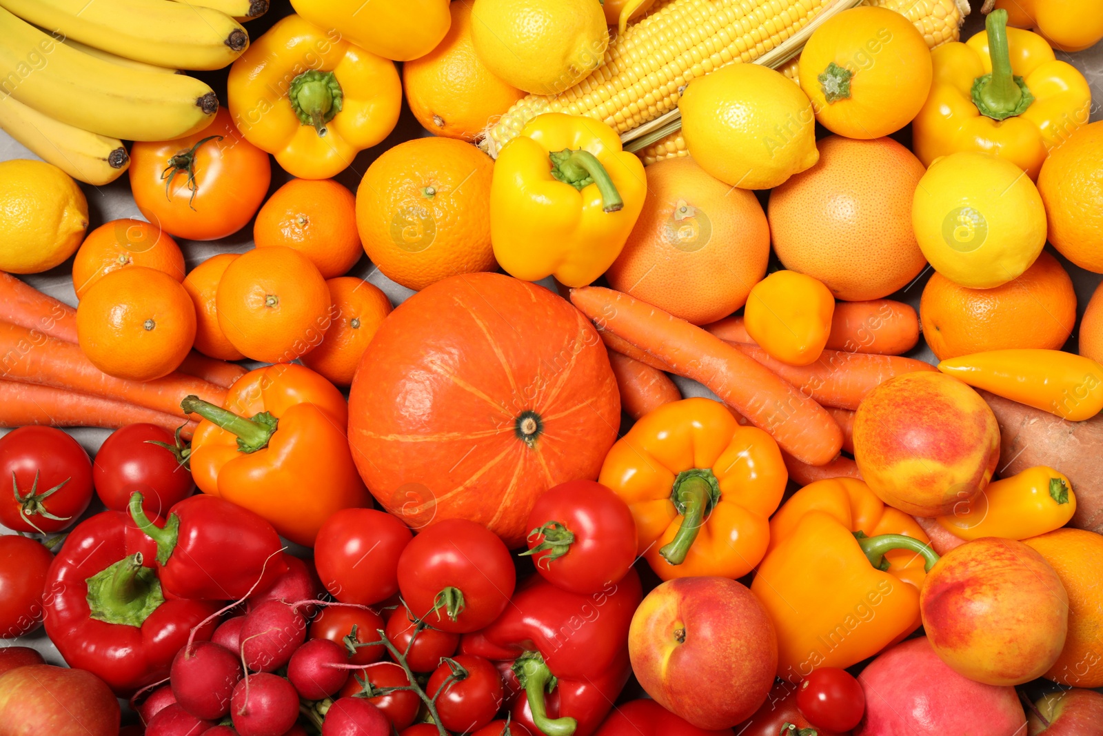 Photo of Assortment of organic fresh fruits and vegetables as background, closeup