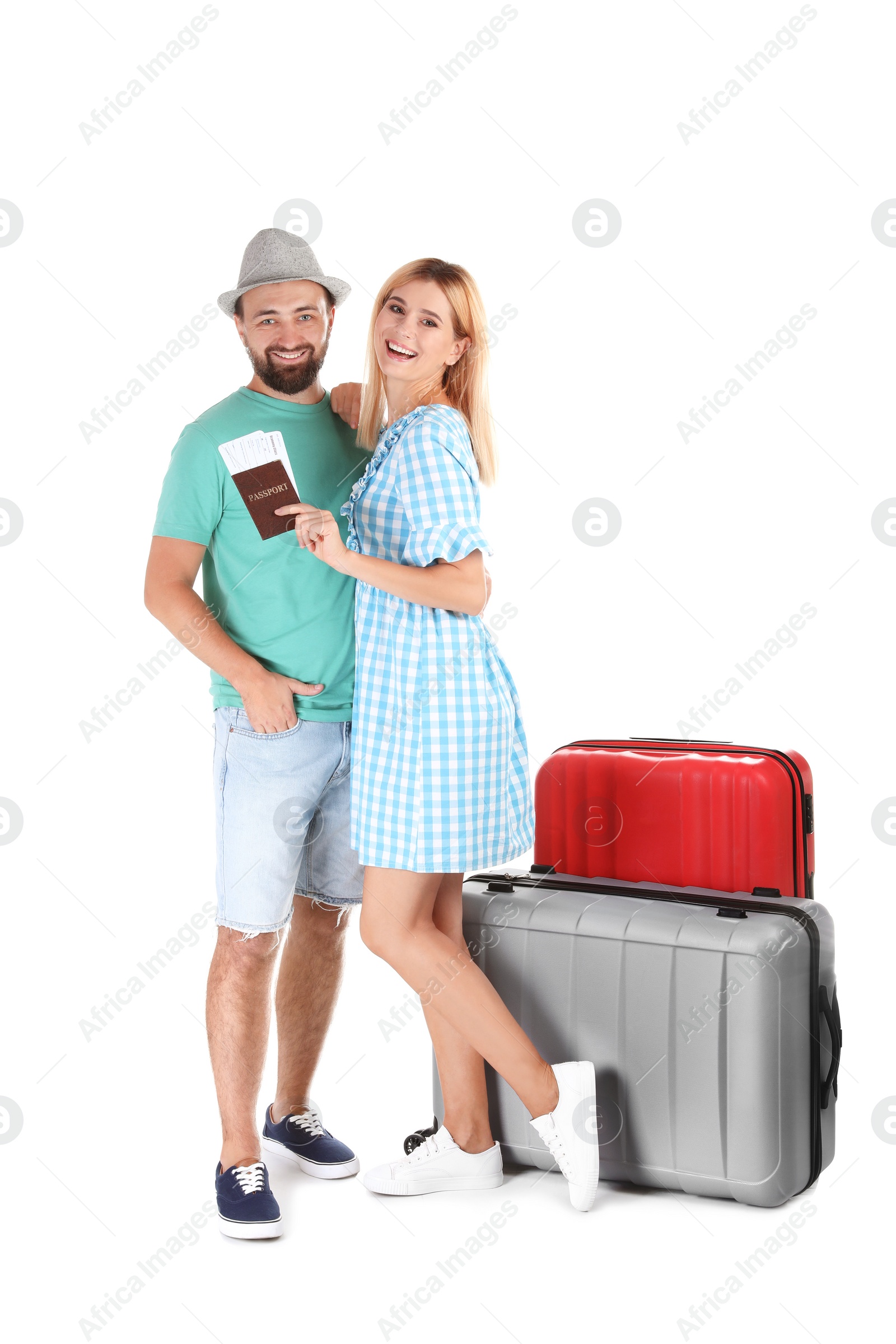 Photo of Couple with suitcases and passport on white background. Vacation travel
