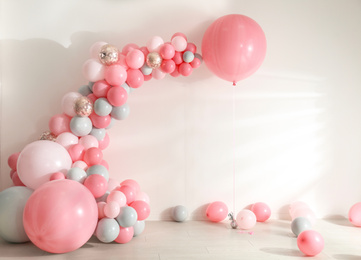Photo of Room decorated with colorful balloons for party