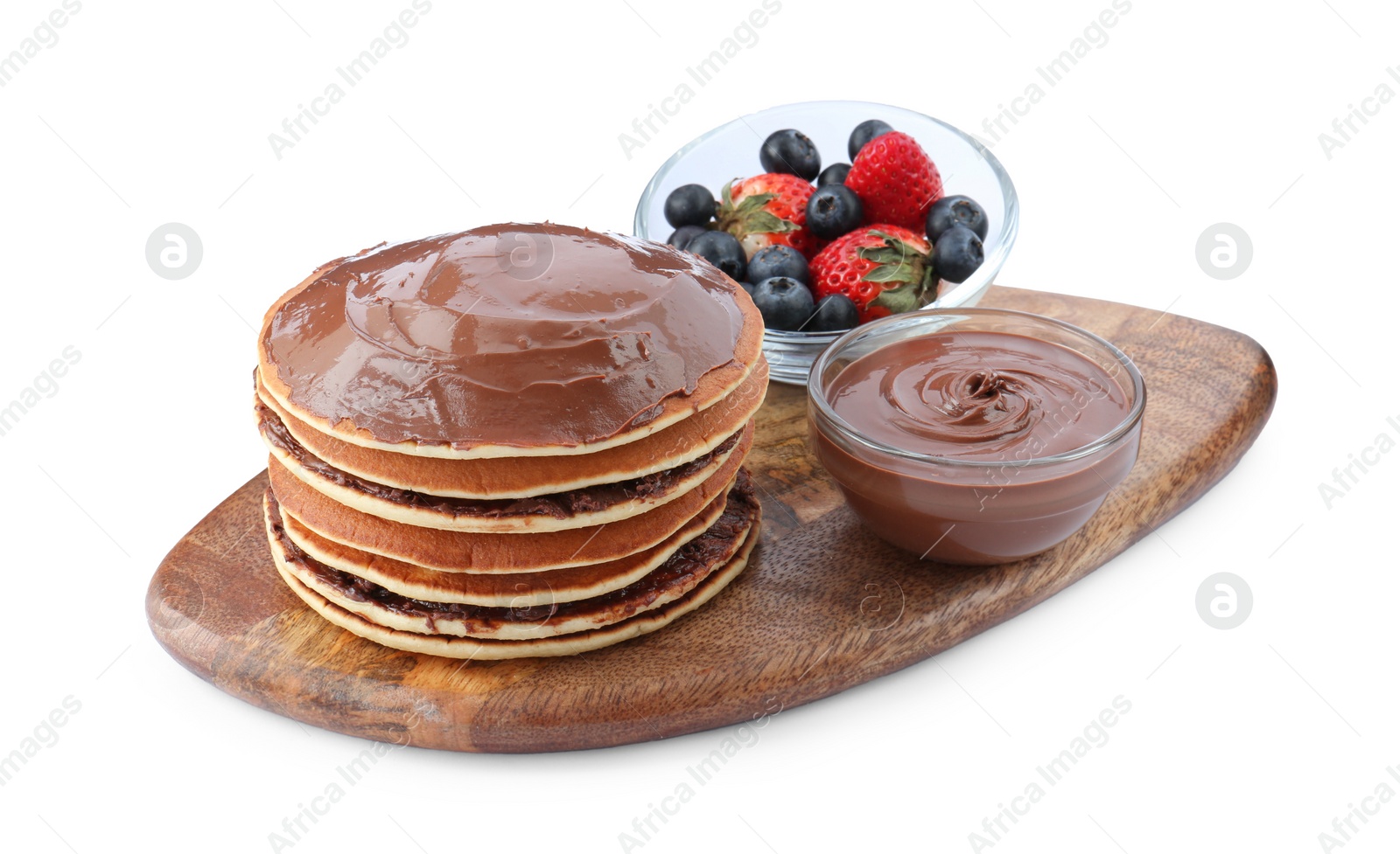 Photo of Tasty pancakes with chocolate paste and berries isolated on white