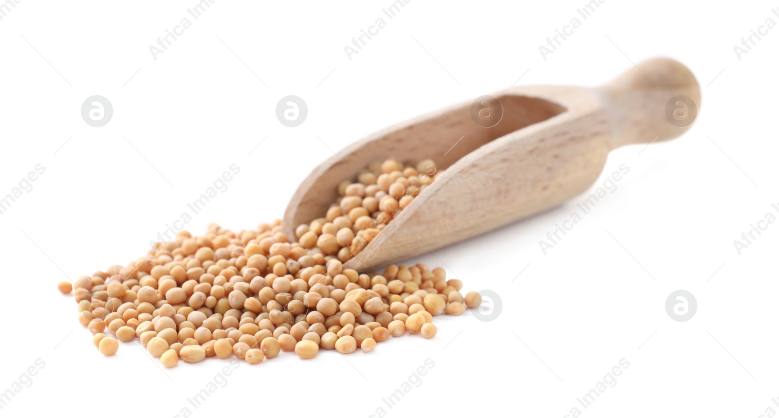 Photo of Mustard seeds with wooden scoop isolated on white