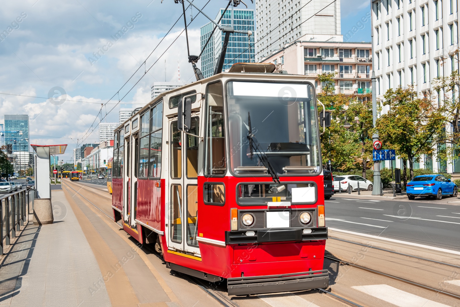 Photo of Streetcar on road in city. Public transport