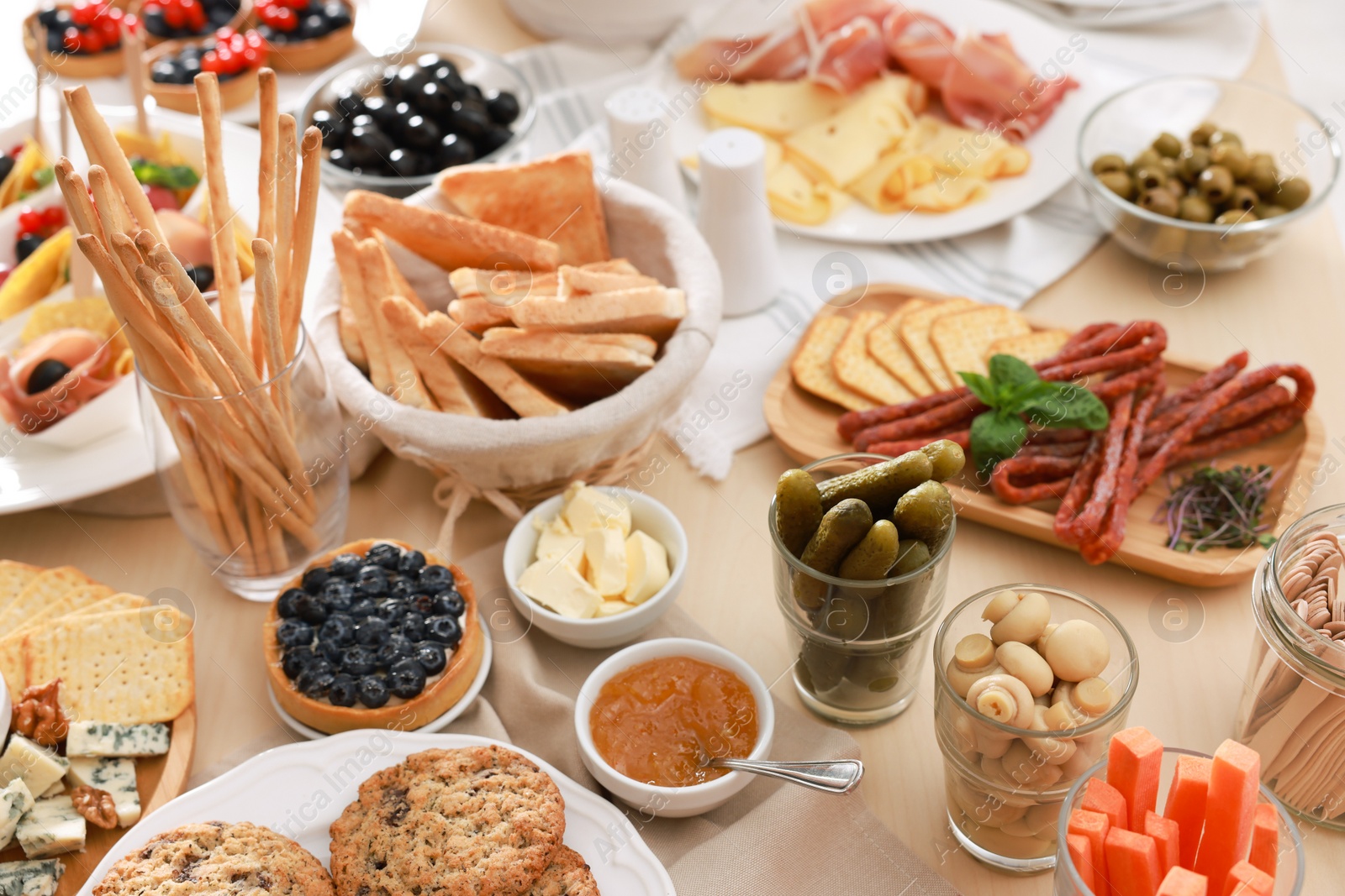 Photo of Dishes with different food on table. Luxury brunch