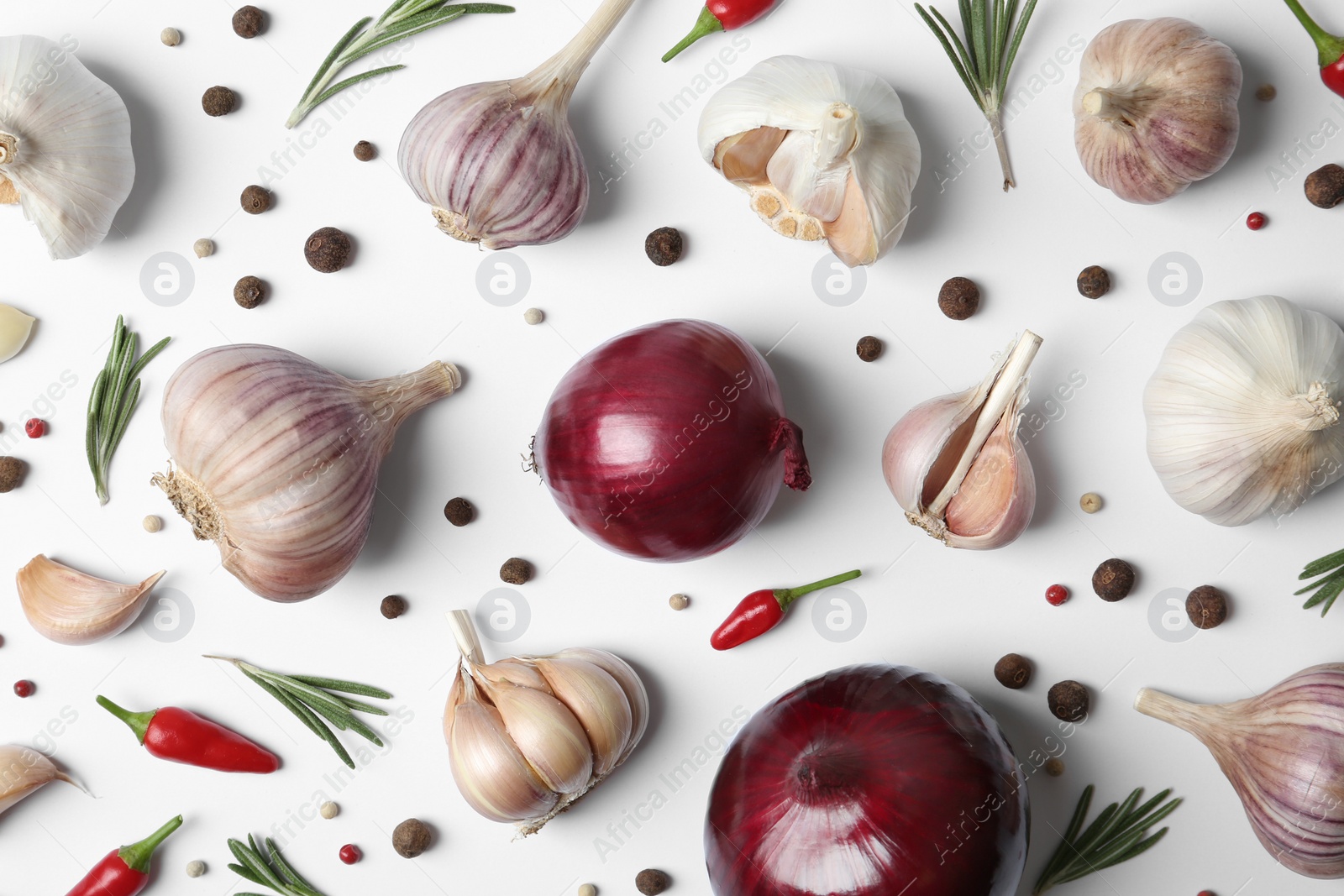 Photo of Composition with garlic, peppers and onions on white background, top view