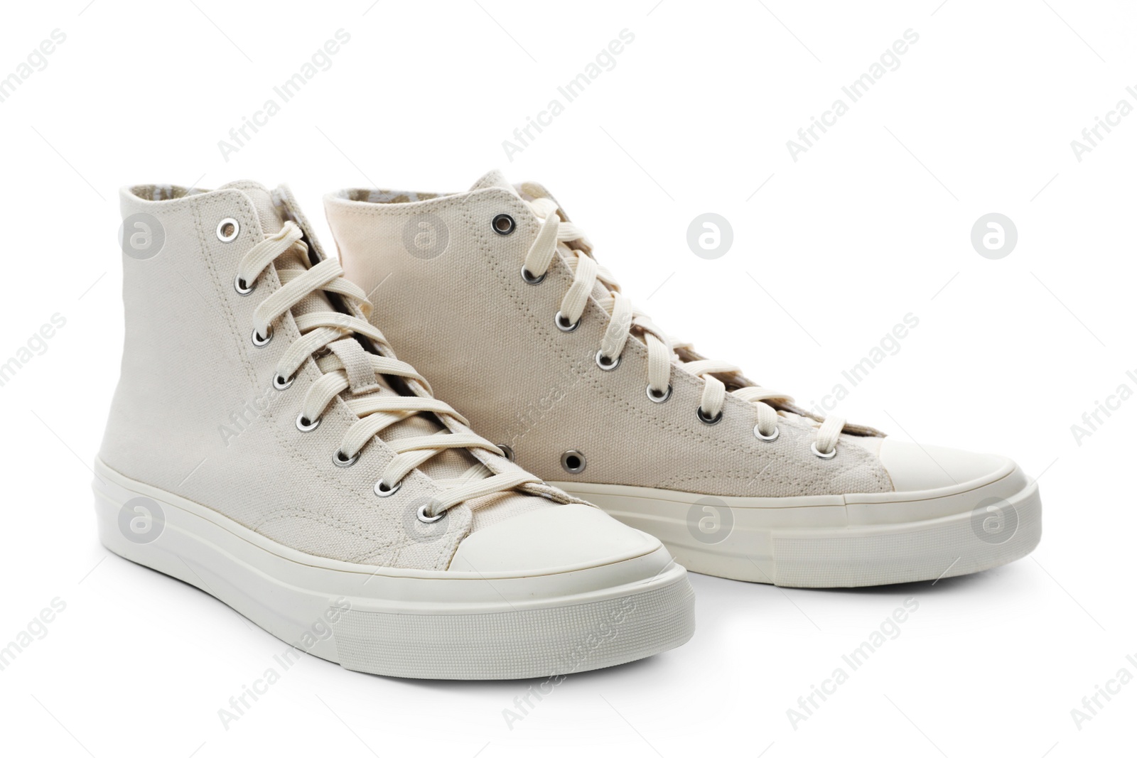 Photo of Pair of sneakers isolated on white