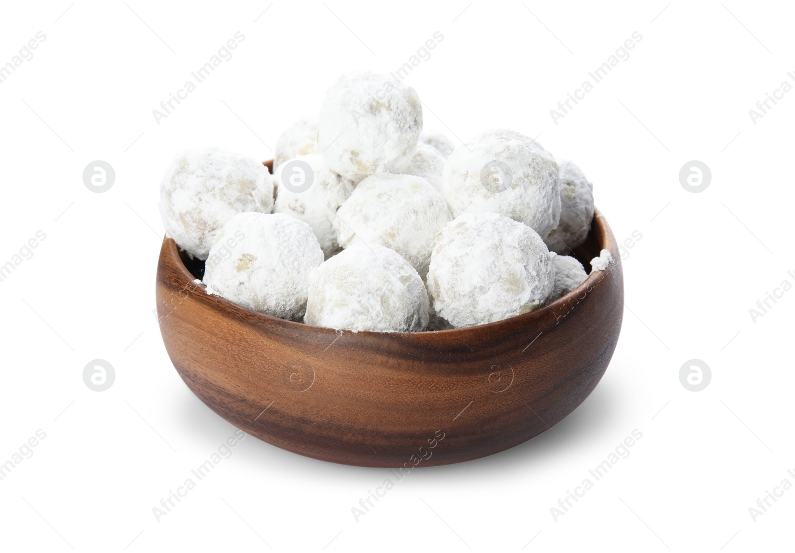 Photo of Christmas snowball cookies in wooden bowl isolated on white