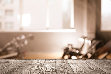 Image of Empty wooden surface in modern gym interior