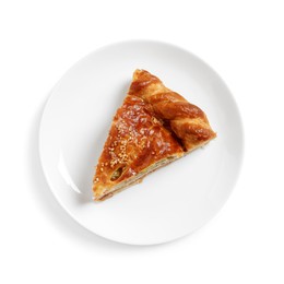 Photo of Piece of tasty homemade pie with filling isolated on white, top view