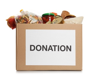 Photo of Donation box full of different products on white background