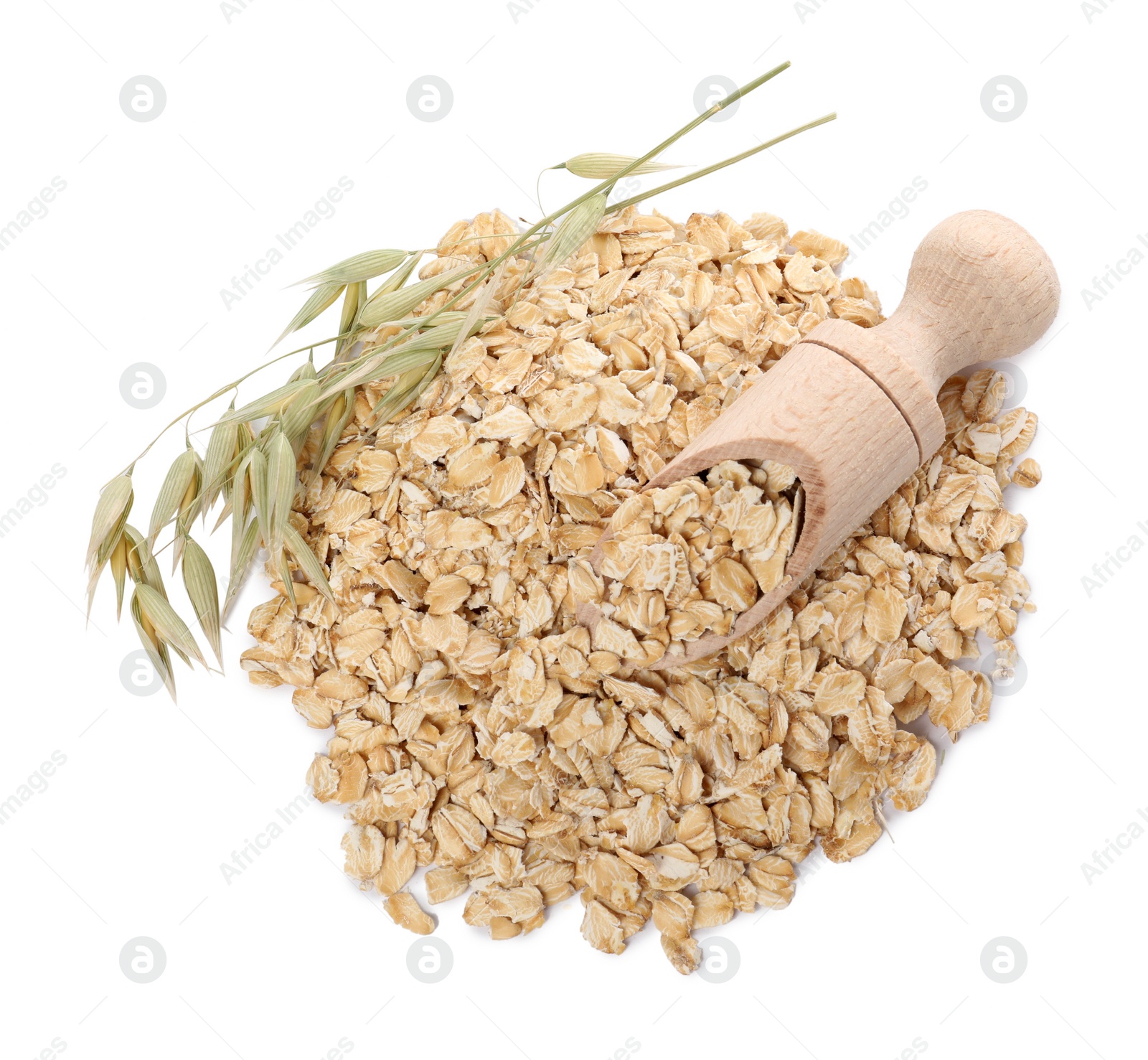 Photo of Scoop with oatmeal and florets isolated on white, top view