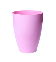 Pink plastic flower pot isolated on white