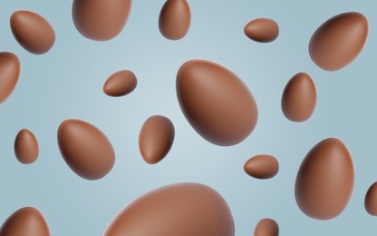 Image of Many chocolate eggs falling on dusty light blue background