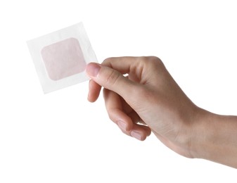 Photo of Woman holding medical adhesive bandage isolated on white, closeup