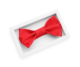 Photo of Stylish red bow tie on white background, top view