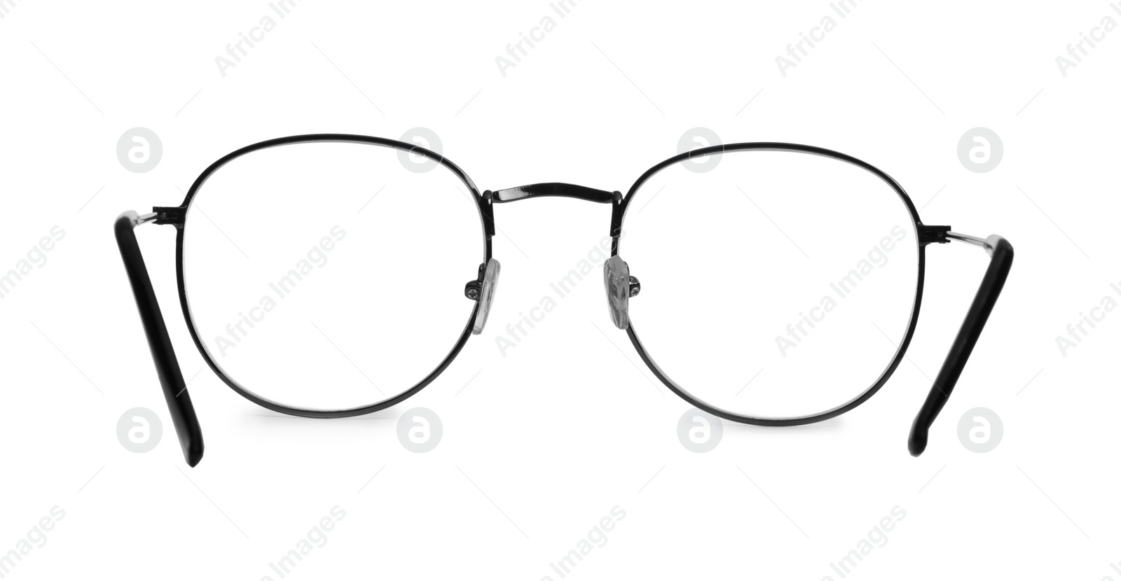 Photo of Stylish pair of glasses isolated on white