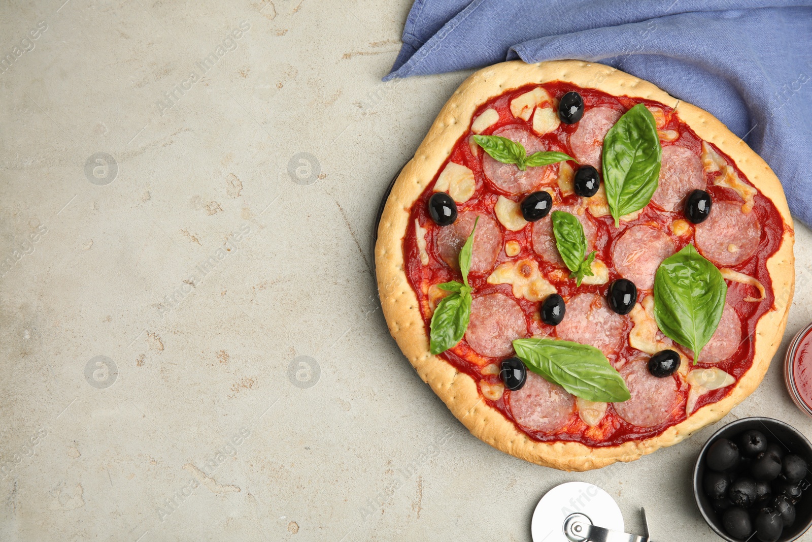 Photo of Delicious homemade pita pizza on light table, flat lay. Space for text