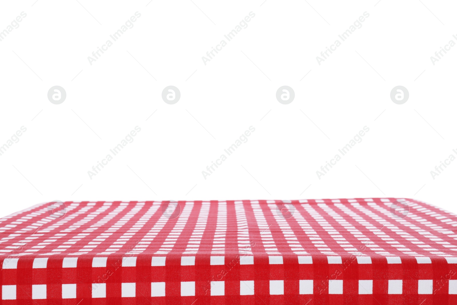 Photo of Table with red checkered tablecloth isolated on white