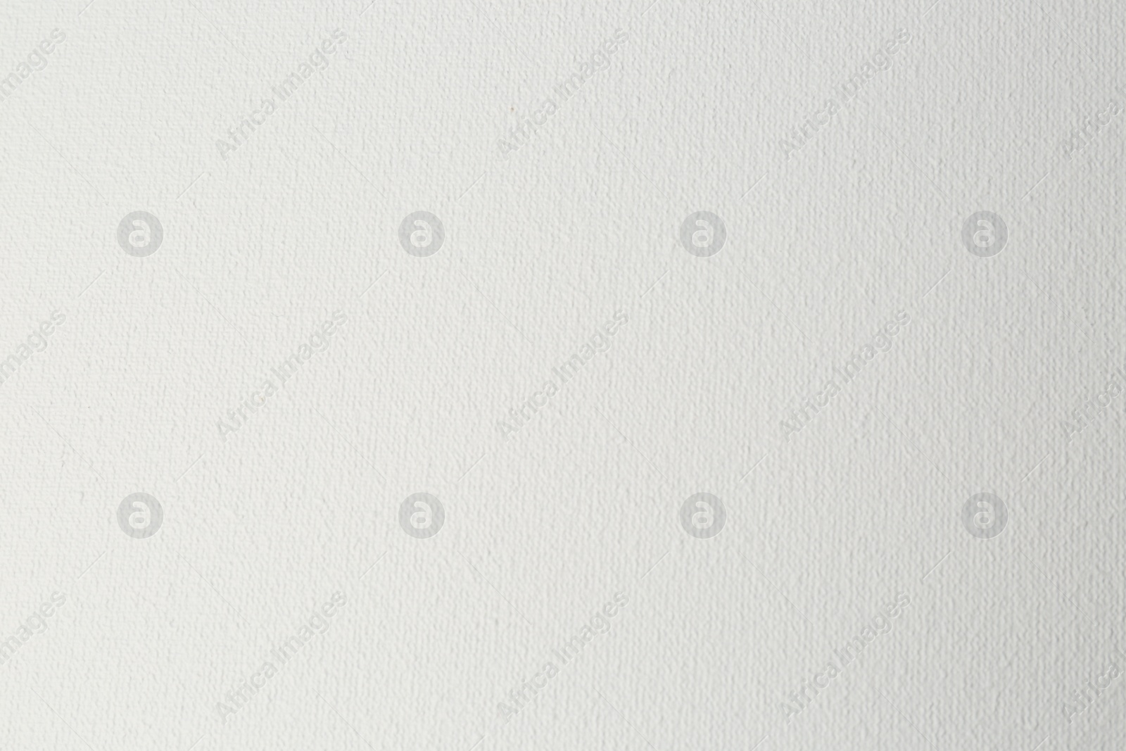 Photo of Blank white canvas as background, closeup view